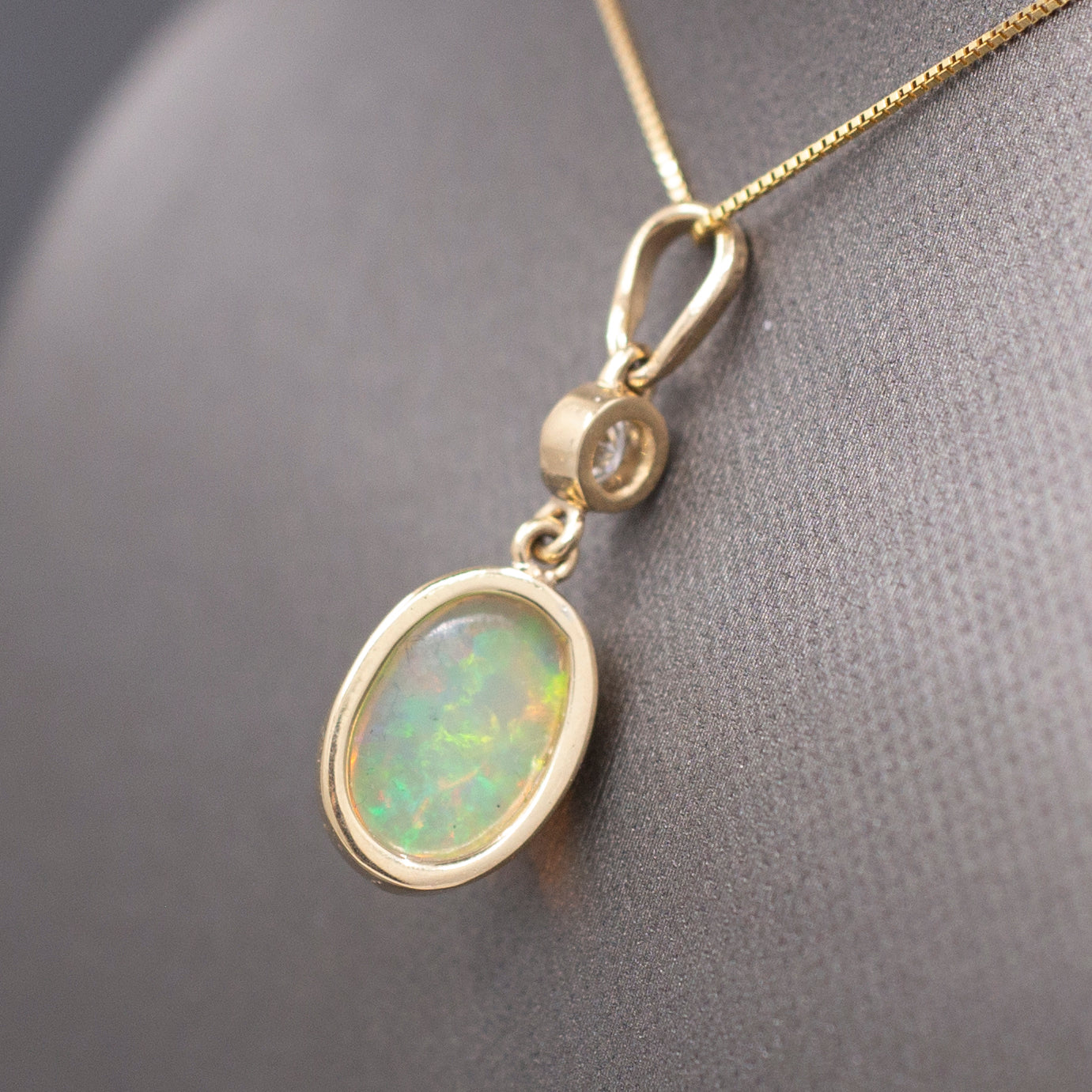 Exquisite Ethiopian Opal and Diamond Bezel Set Pendant Necklace in 14k Yellow Gold