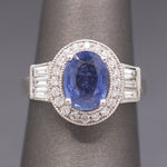 Vintage Oval Blue Sapphire with Round and Baguette Diamond Ring in Platinum