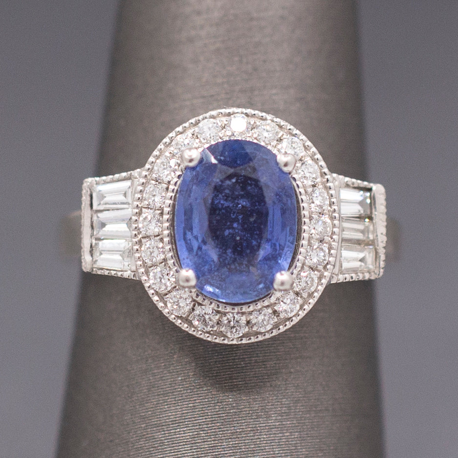 Vintage Oval Blue Sapphire with Round and Baguette Diamond Ring in Platinum