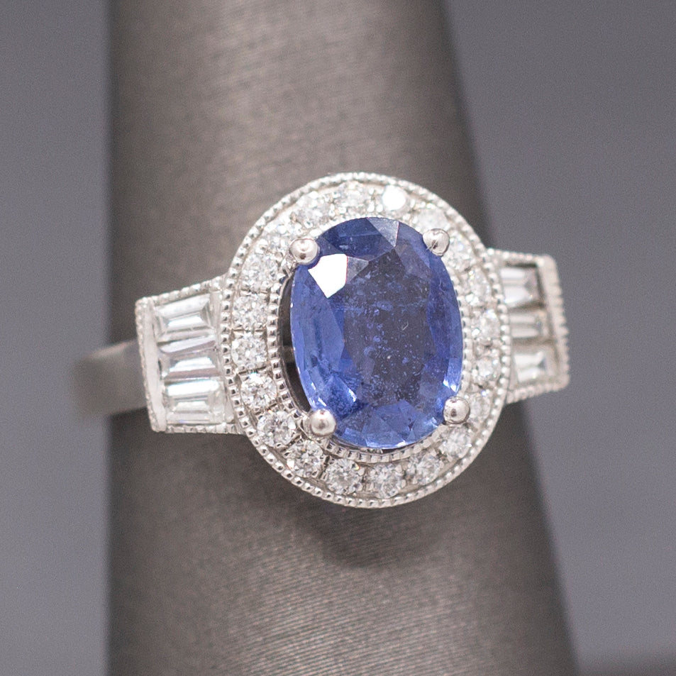 Vintage Oval Blue Sapphire with Round and Baguette Diamond Ring in Platinum