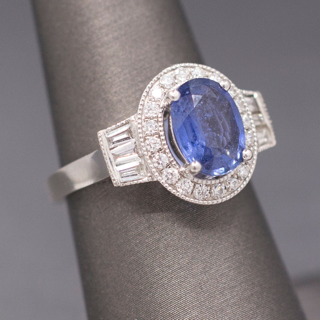 Vintage Oval Blue Sapphire with Round and Baguette Diamond Ring in Platinum