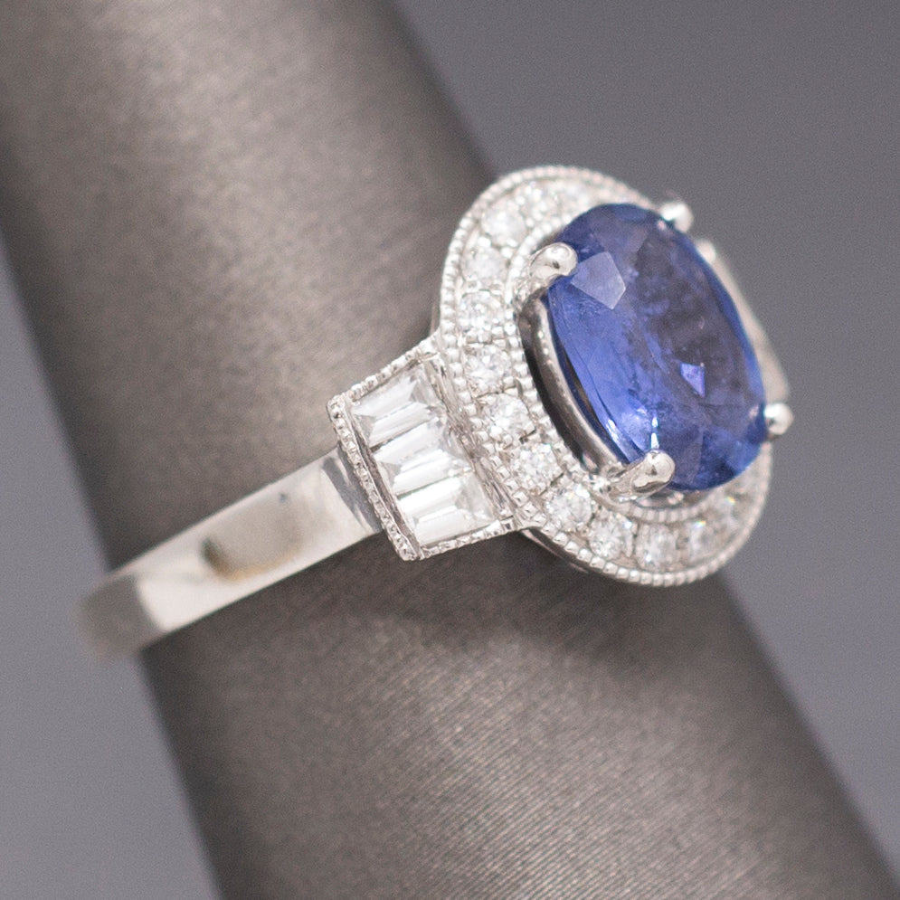 Vintage Oval Blue Sapphire with Round and Baguette Diamond Ring in Platinum