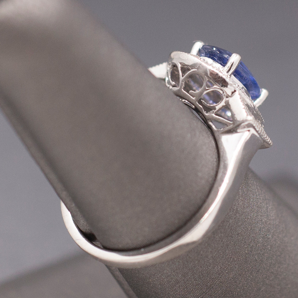 Vintage Oval Blue Sapphire with Round and Baguette Diamond Ring in Platinum