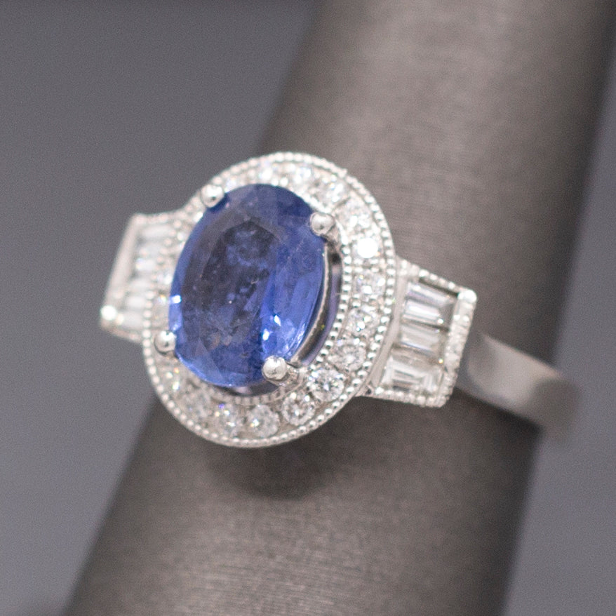 Vintage Oval Blue Sapphire with Round and Baguette Diamond Ring in Platinum
