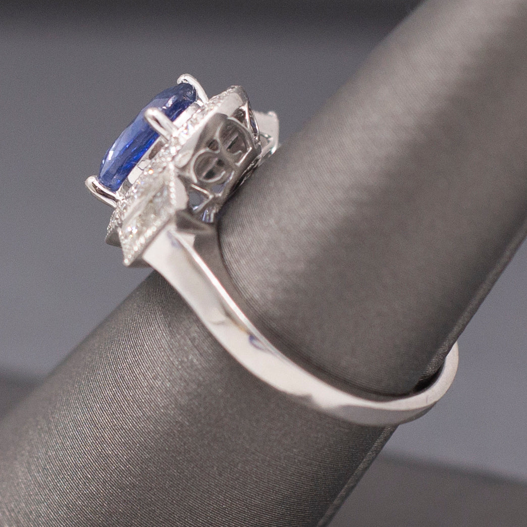 Vintage Oval Blue Sapphire with Round and Baguette Diamond Ring in Platinum