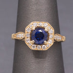 Vintage Sparkling Blue Sapphire and Diamond Octagonal Halo in 14k Yellow Gold
