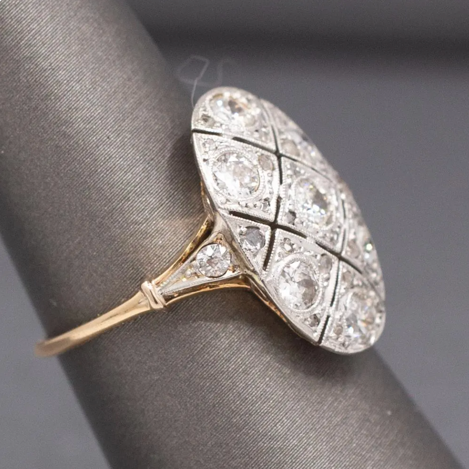 Edwardian Oval Old European Cut and Rose Cut Diamond Panel Ring in 18k and Platinum