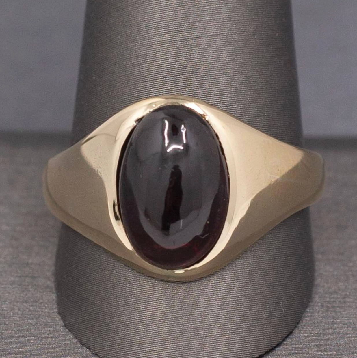 Vintage Oval Garnet Cabochon Flush Set Ring in 10k Yellow Gold