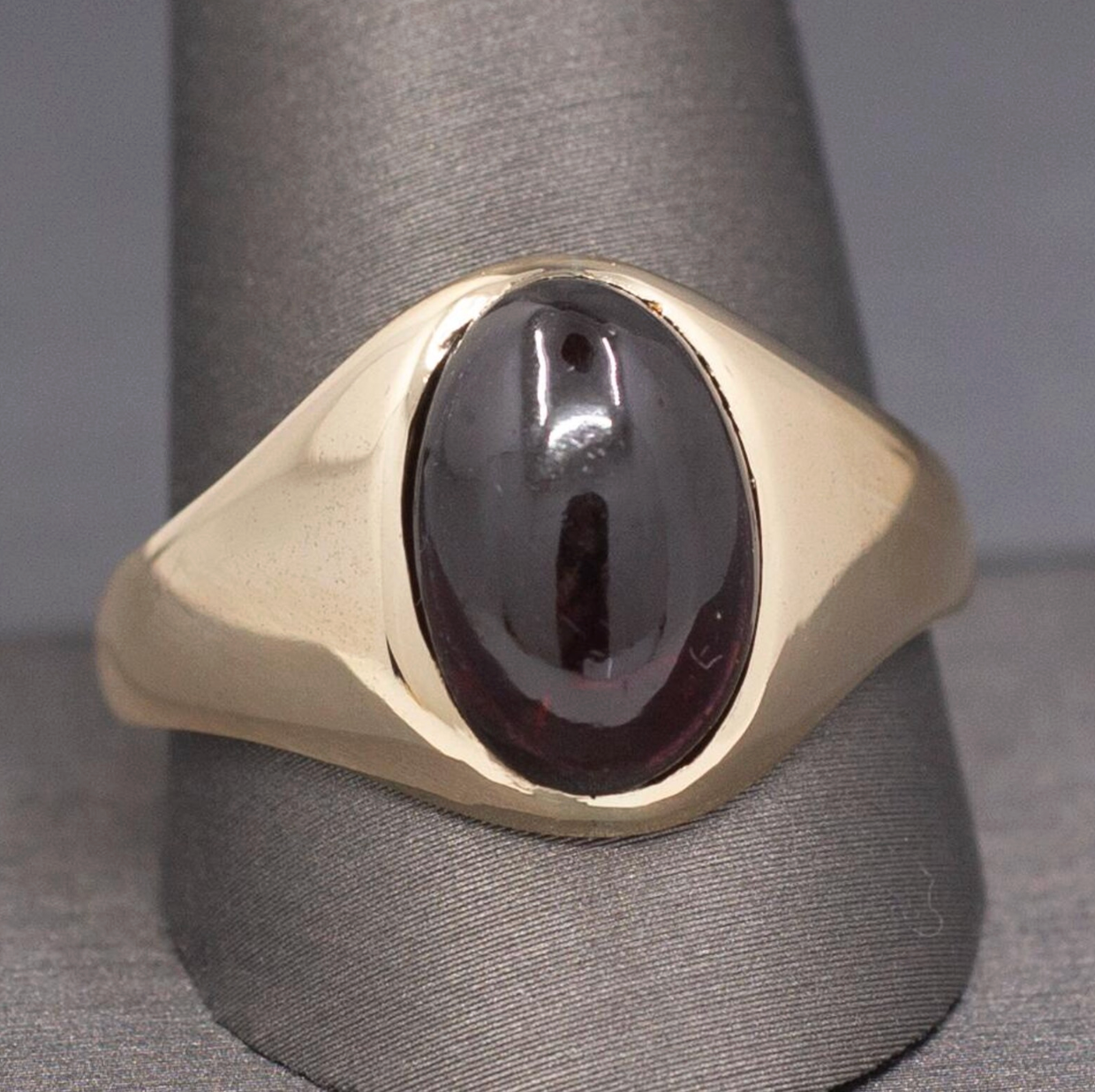 Vintage Oval Garnet Cabochon Flush Set Ring in 10k Yellow Gold