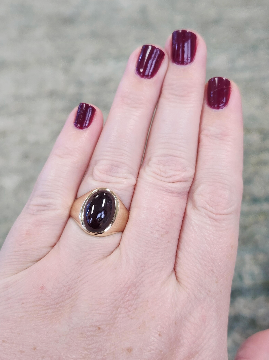 Vintage Oval Garnet Cabochon Flush Set Ring in 10k Yellow Gold