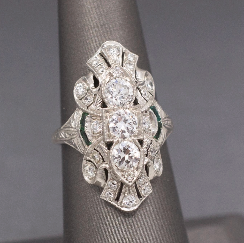 Exquisite Art Deco Elongated Emerald and Old European Cut Diamond Ring in Platinum
