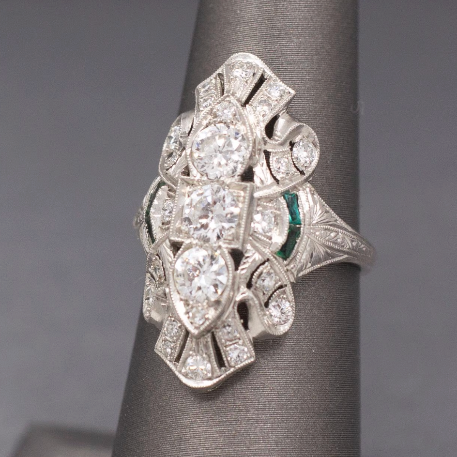 Exquisite Art Deco Elongated Emerald and Old European Cut Diamond Ring in Platinum