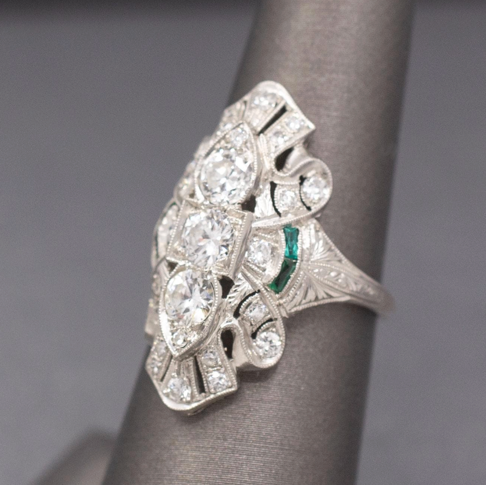 Exquisite Art Deco Elongated Emerald and Old European Cut Diamond Ring in Platinum