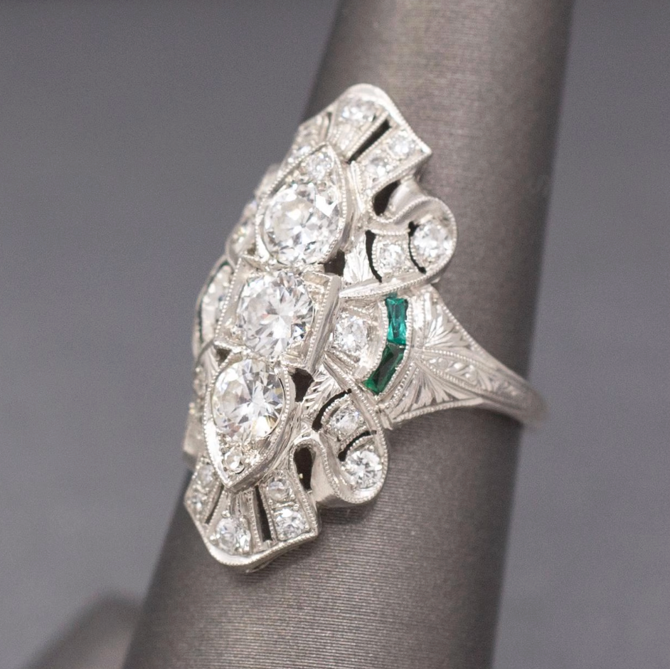 Exquisite Art Deco Elongated Emerald and Old European Cut Diamond Ring in Platinum