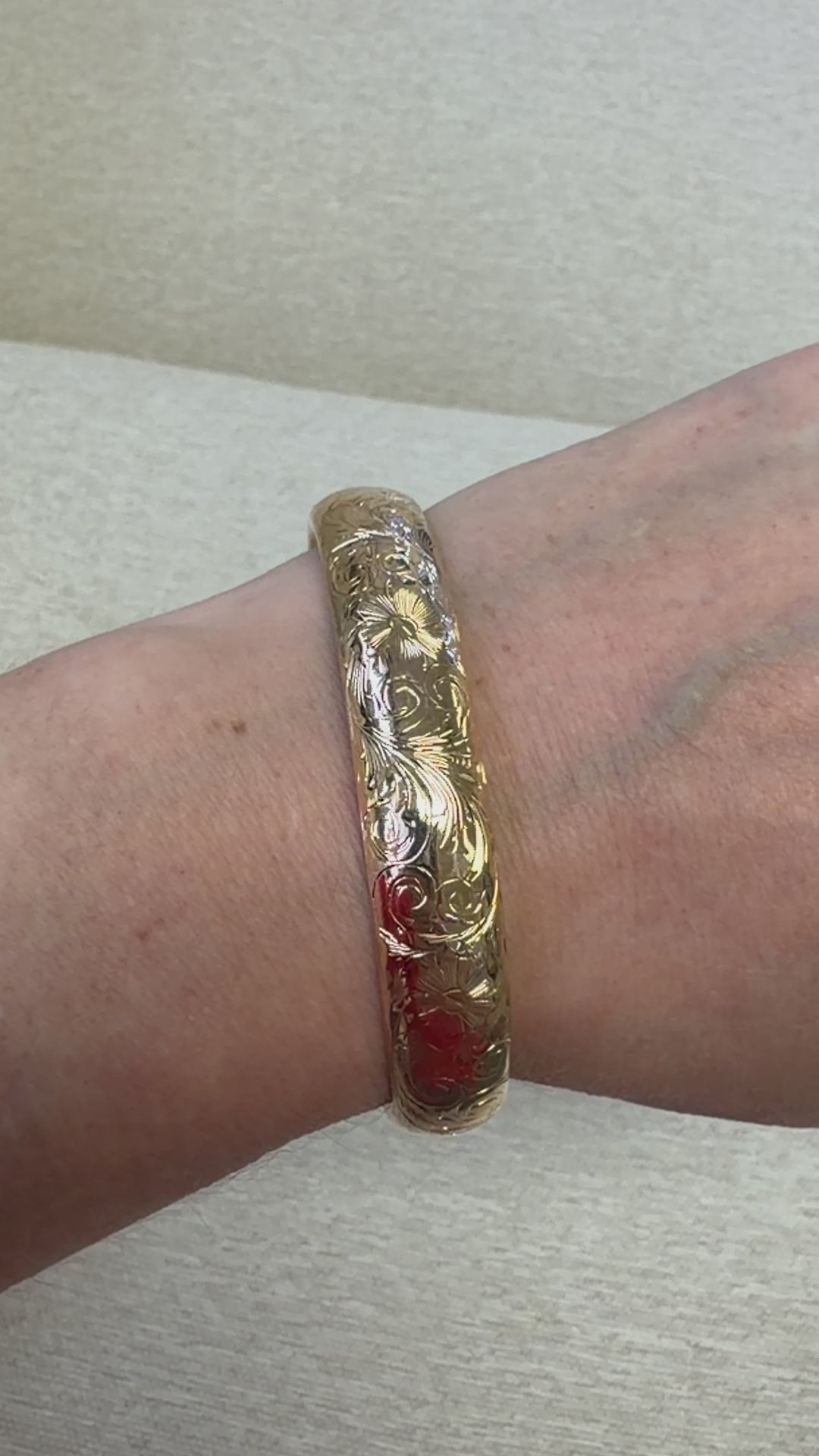 Floral Engraved Domed Oval Hinged Bangle in 14k Yellow Gold