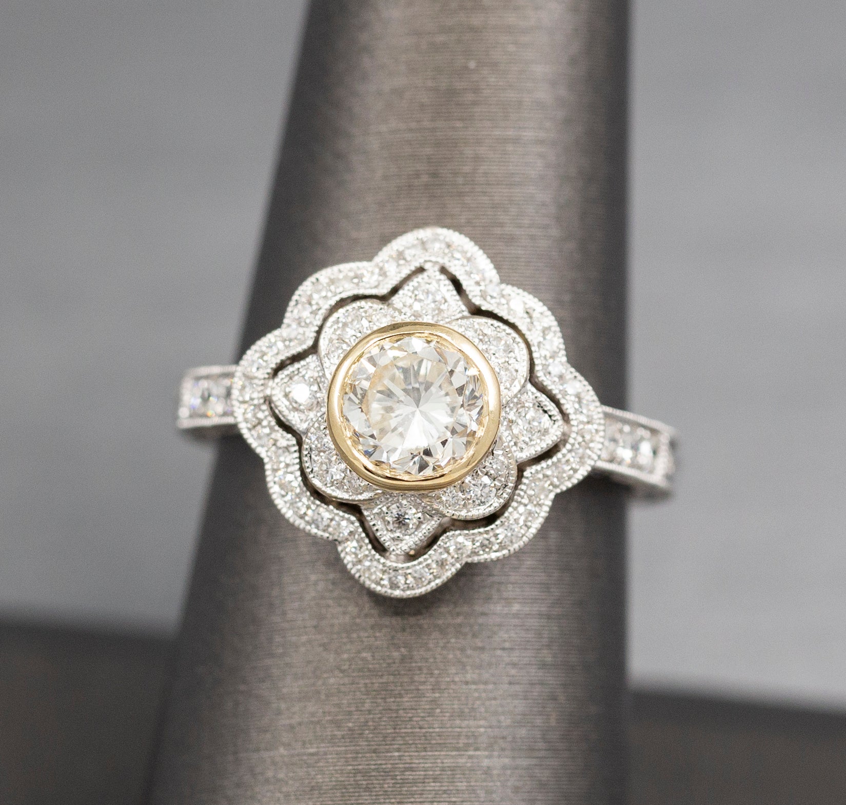 Vintage Style Bezel Set Diamond Engagement Ring with Engraved Band in 14k Yellow and White Gold