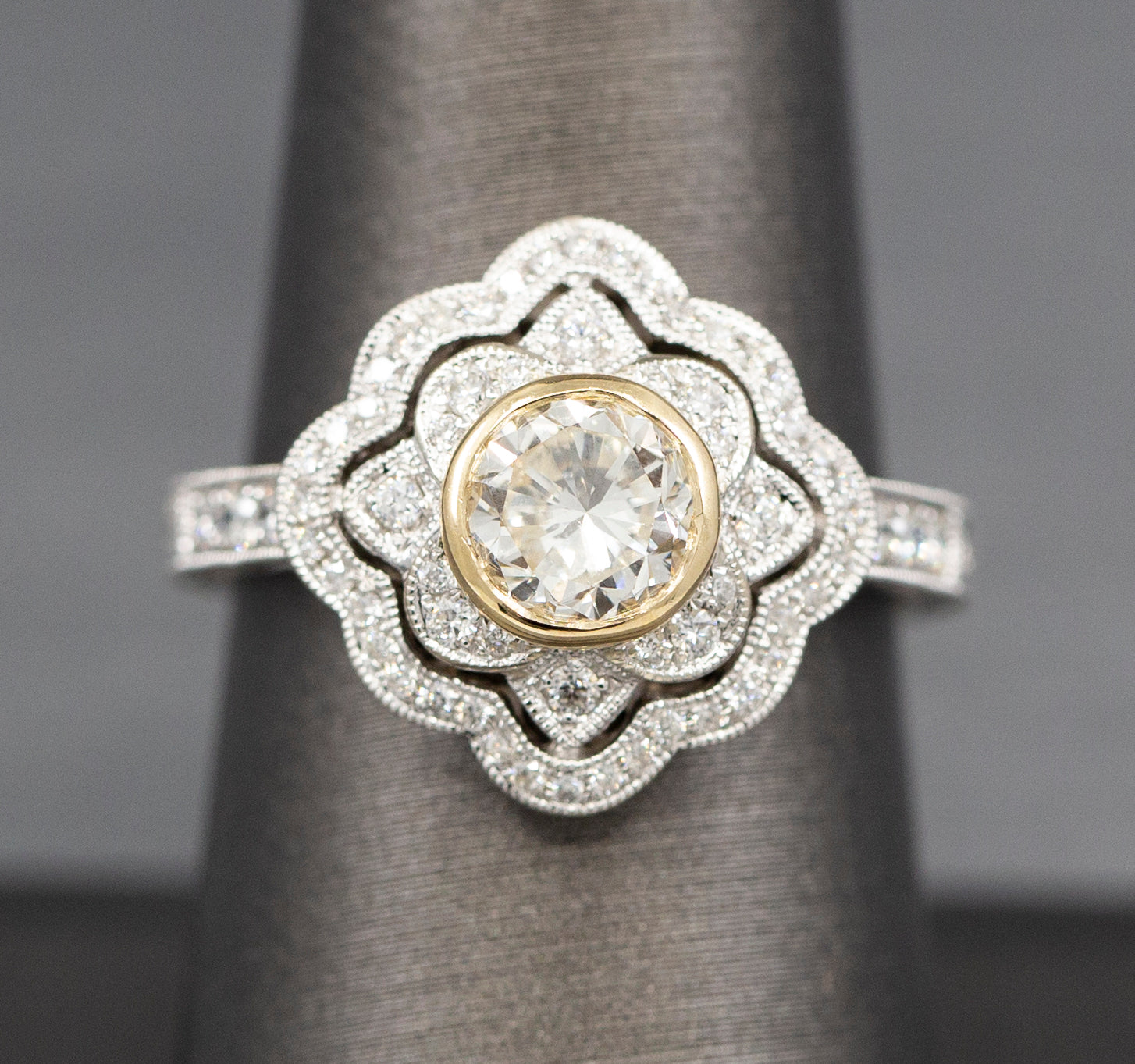 Vintage Style Bezel Set Diamond Engagement Ring with Engraved Band in 14k Yellow and White Gold