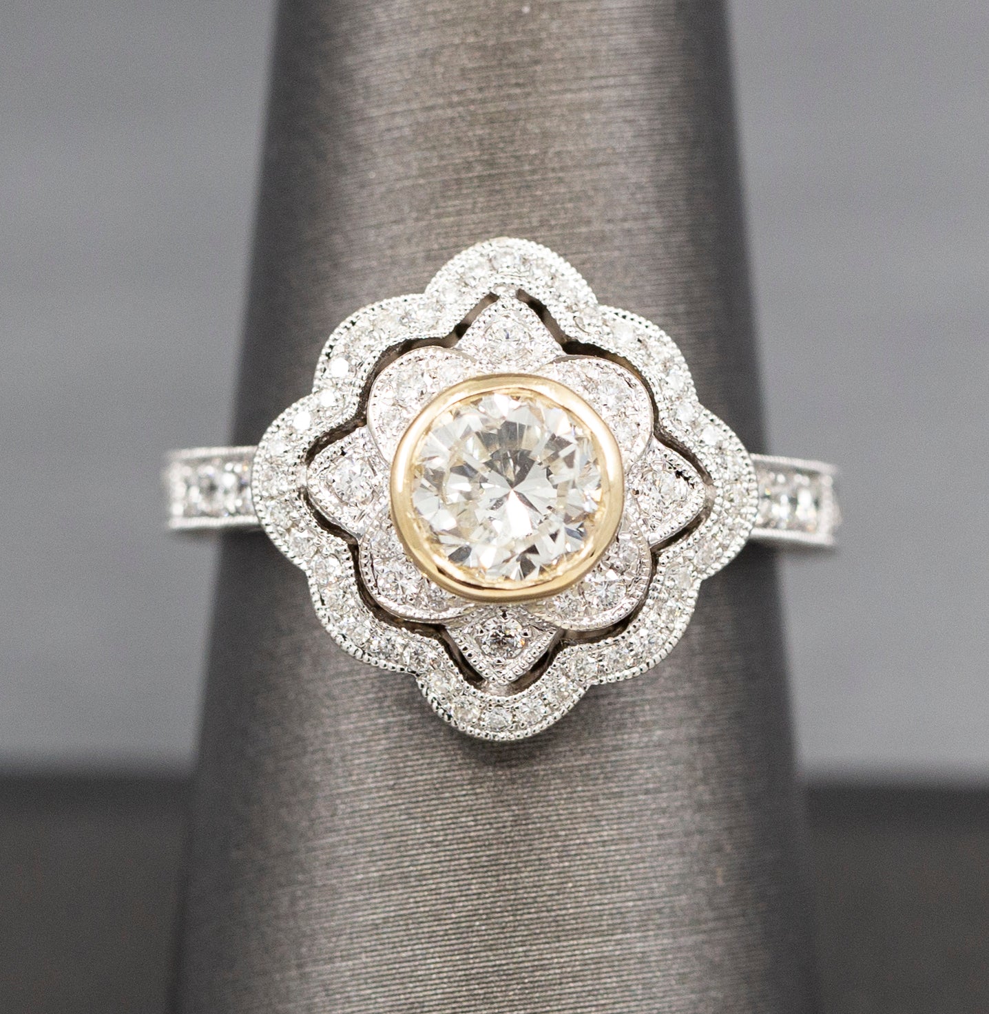 Vintage Style Bezel Set Diamond Engagement Ring with Engraved Band in 14k Yellow and White Gold