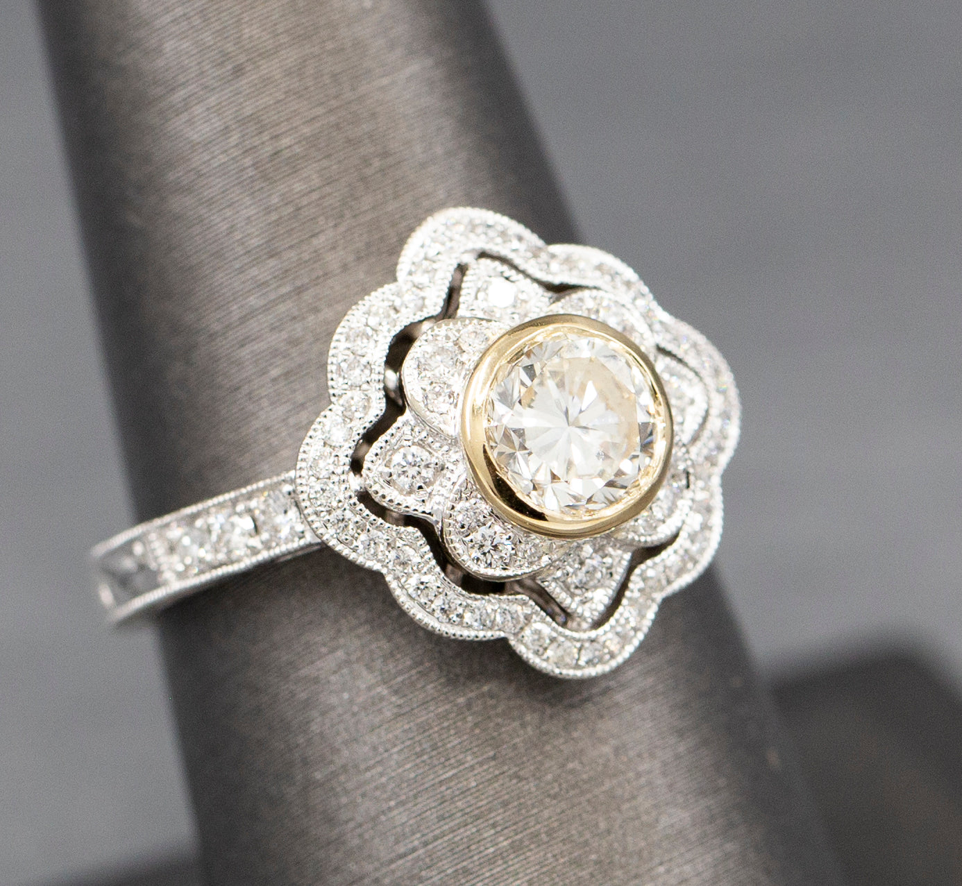 Vintage Style Bezel Set Diamond Engagement Ring with Engraved Band in 14k Yellow and White Gold