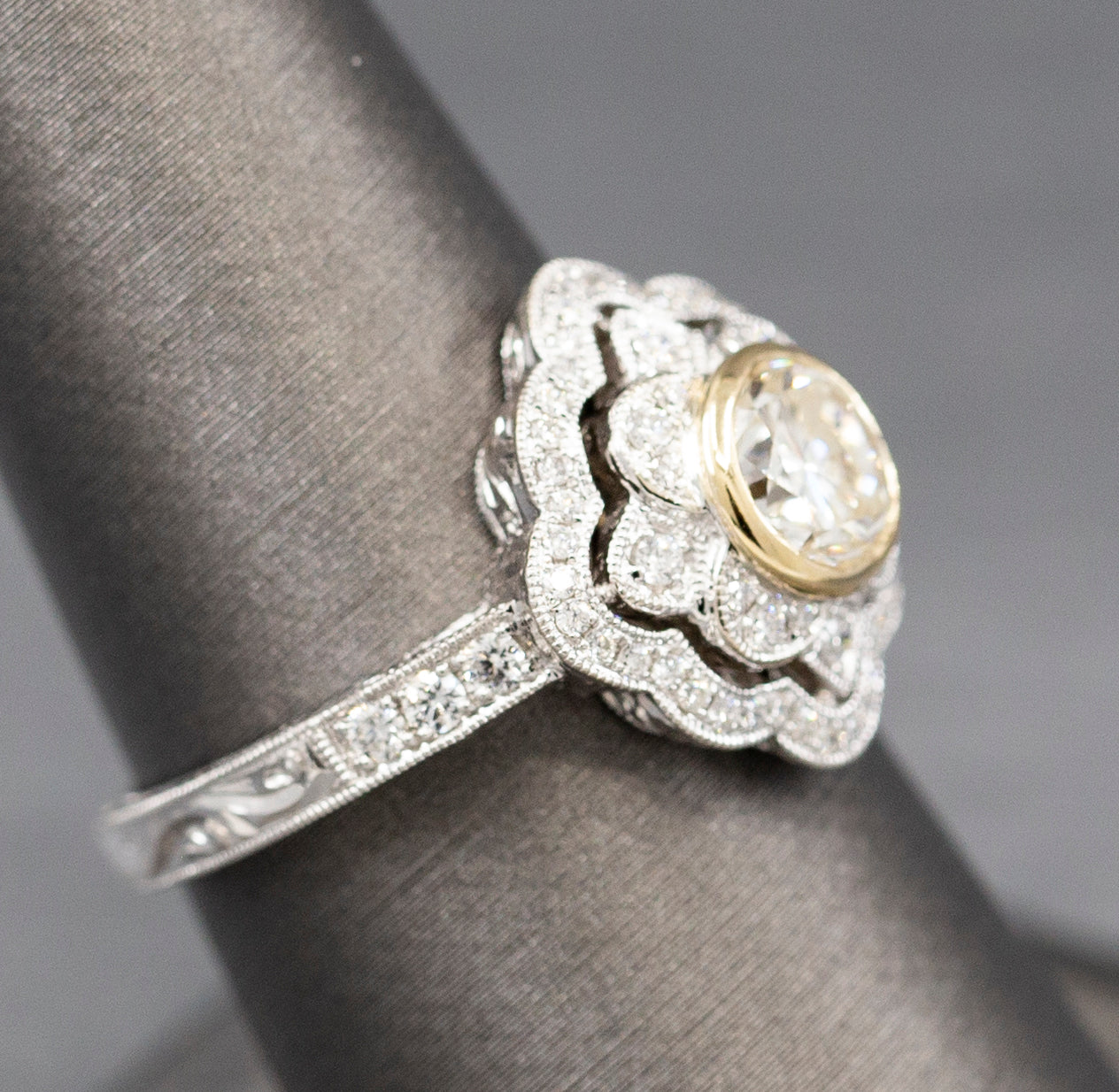 Vintage Style Bezel Set Diamond Engagement Ring with Engraved Band in 14k Yellow and White Gold