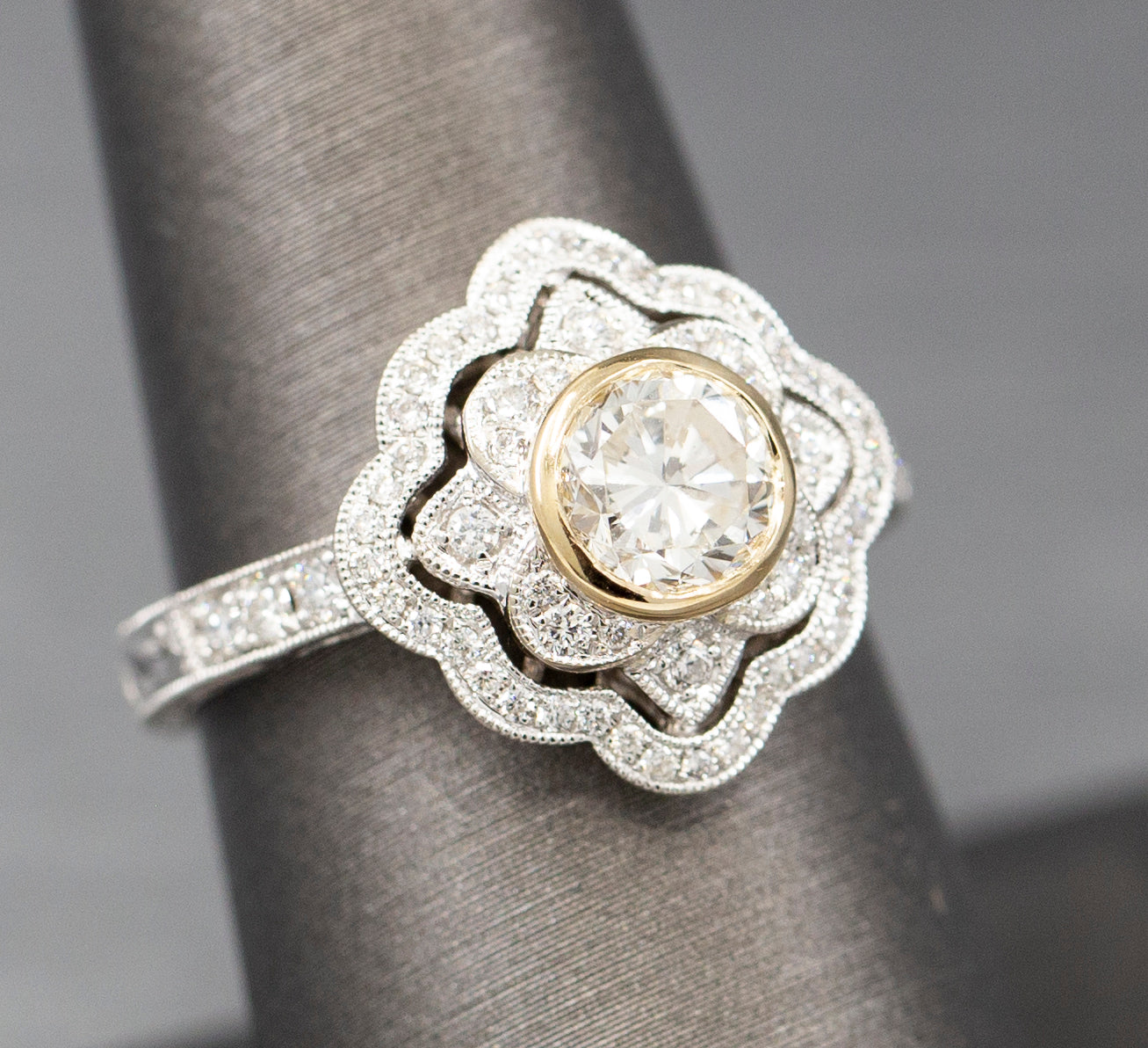 Vintage Style Bezel Set Diamond Engagement Ring with Engraved Band in 14k Yellow and White Gold