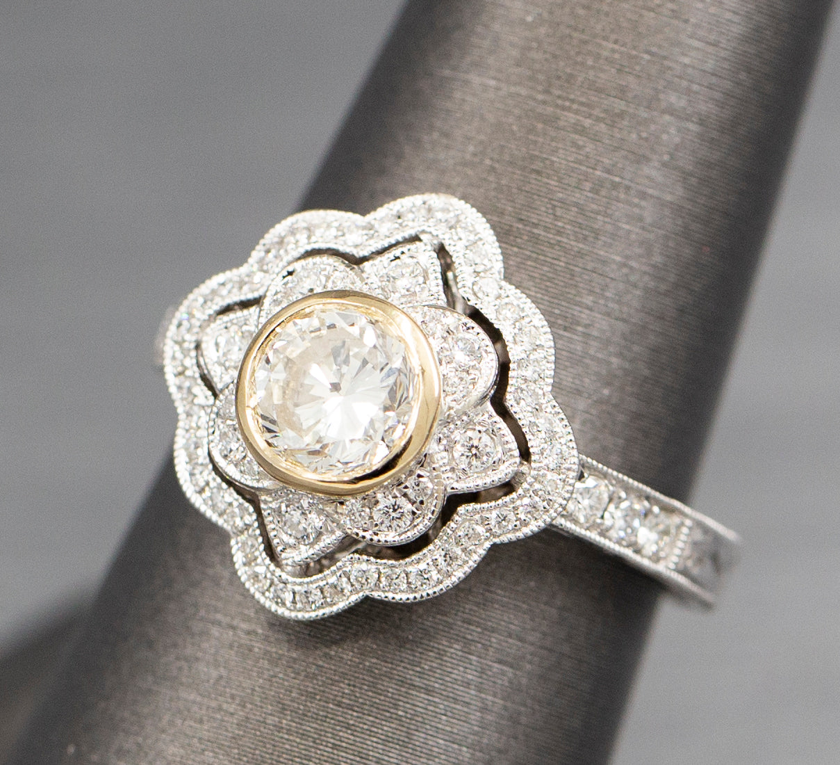 Vintage Style Bezel Set Diamond Engagement Ring with Engraved Band in 14k Yellow and White Gold