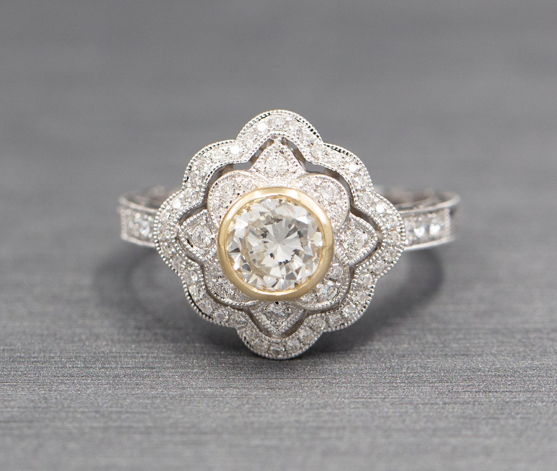 Vintage Style Bezel Set Diamond Engagement Ring with Engraved Band in 14k Yellow and White Gold