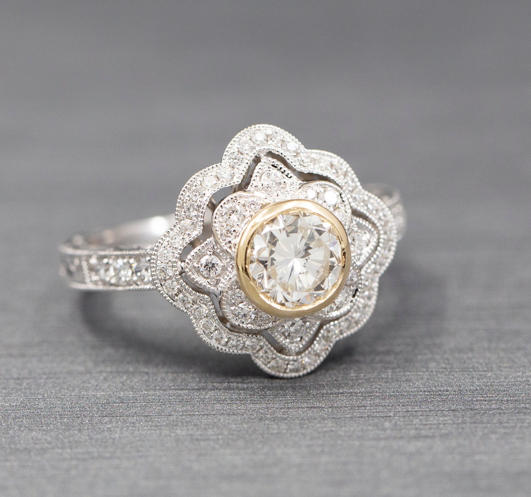 Vintage Style Bezel Set Diamond Engagement Ring with Engraved Band in 14k Yellow and White Gold