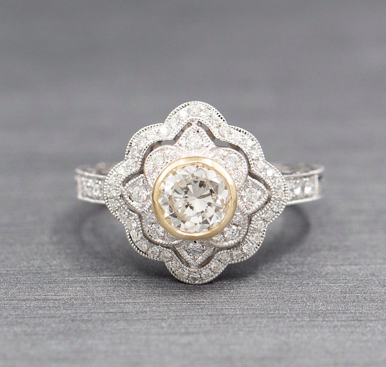 Vintage Style Bezel Set Diamond Engagement Ring with Engraved Band in 14k Yellow and White Gold