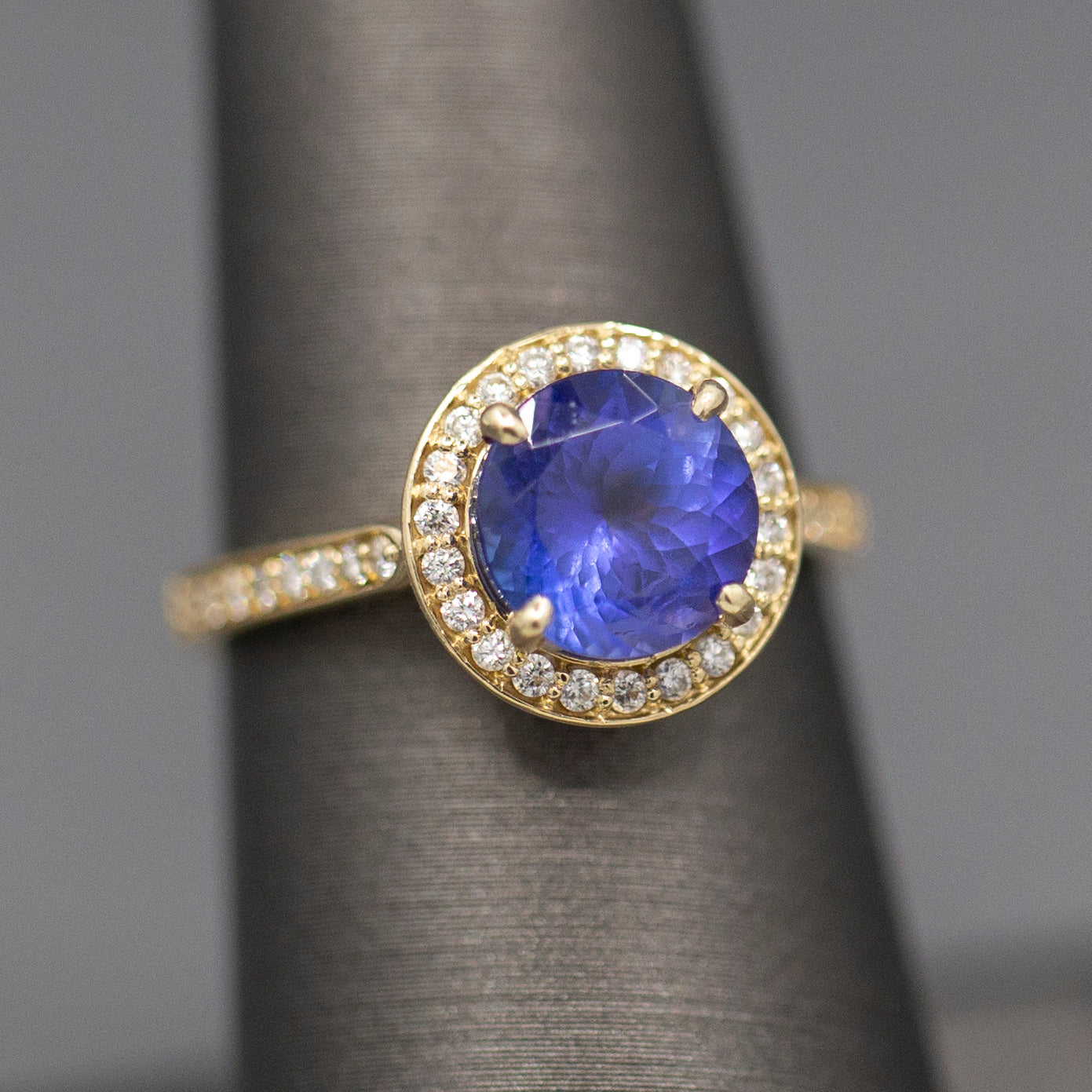 Handcrafted Brilliant Tanzanite and Diamond Halo Ring in 14k Yellow Gold