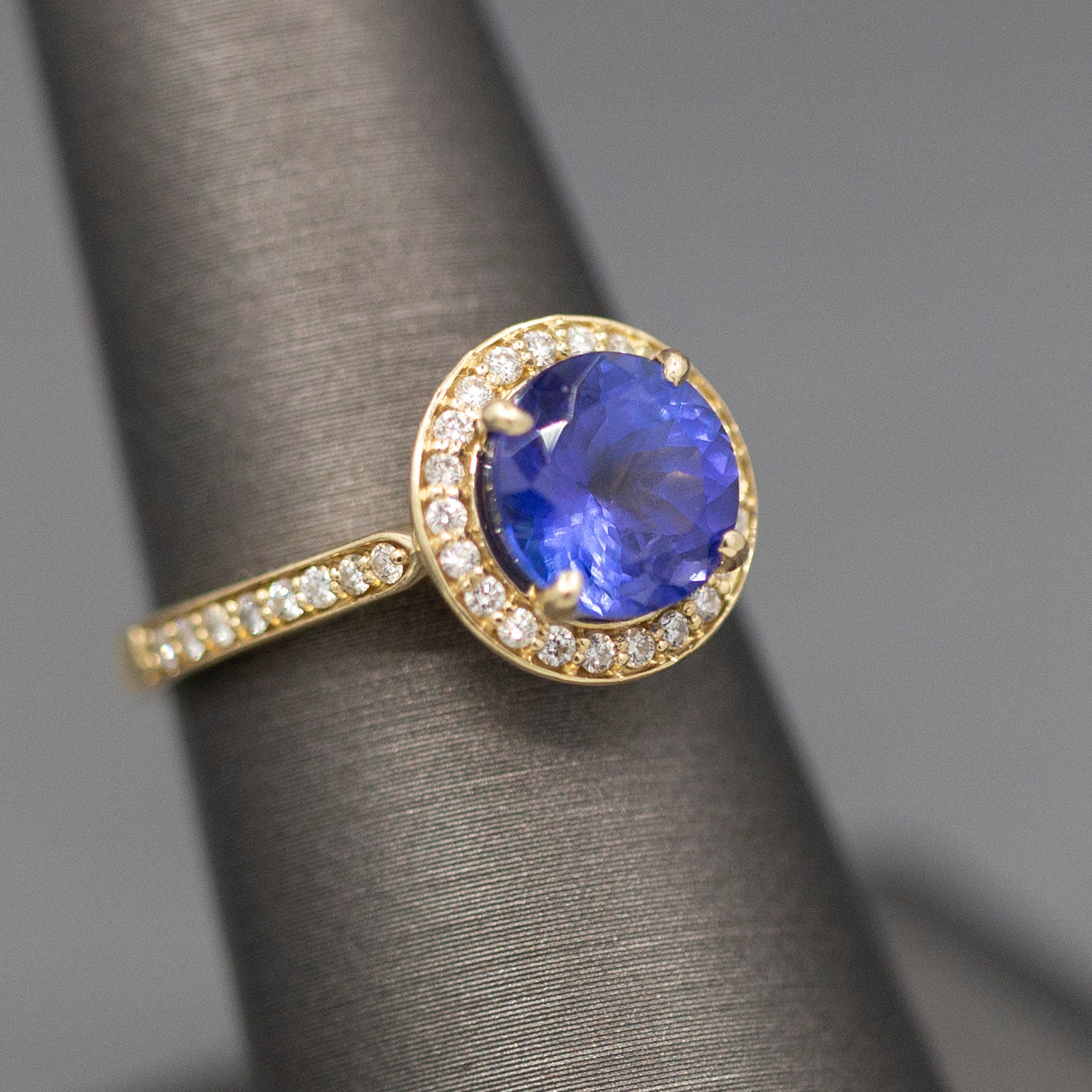 Handcrafted Brilliant Tanzanite and Diamond Halo Ring in 14k Yellow Gold
