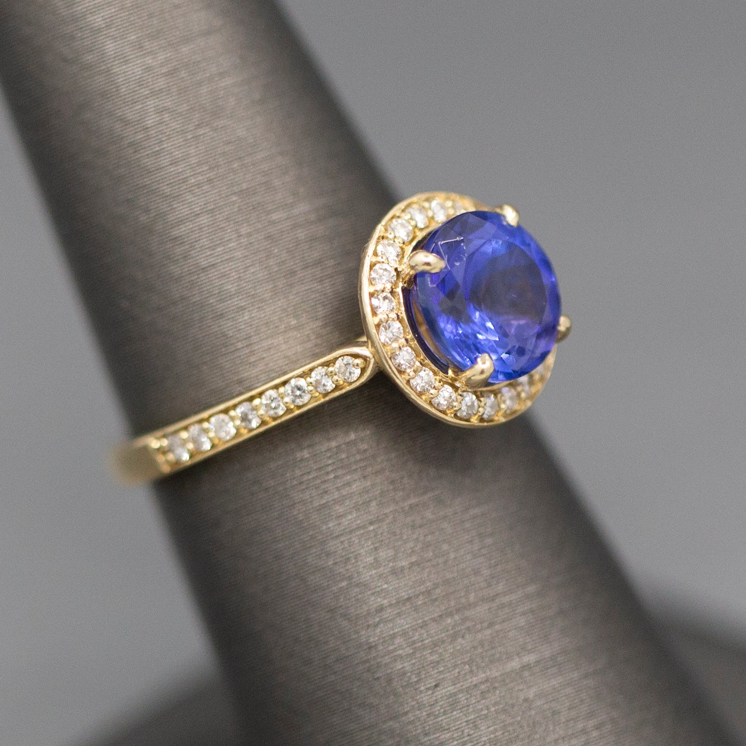 Handcrafted Brilliant Tanzanite and Diamond Halo Ring in 14k Yellow Gold