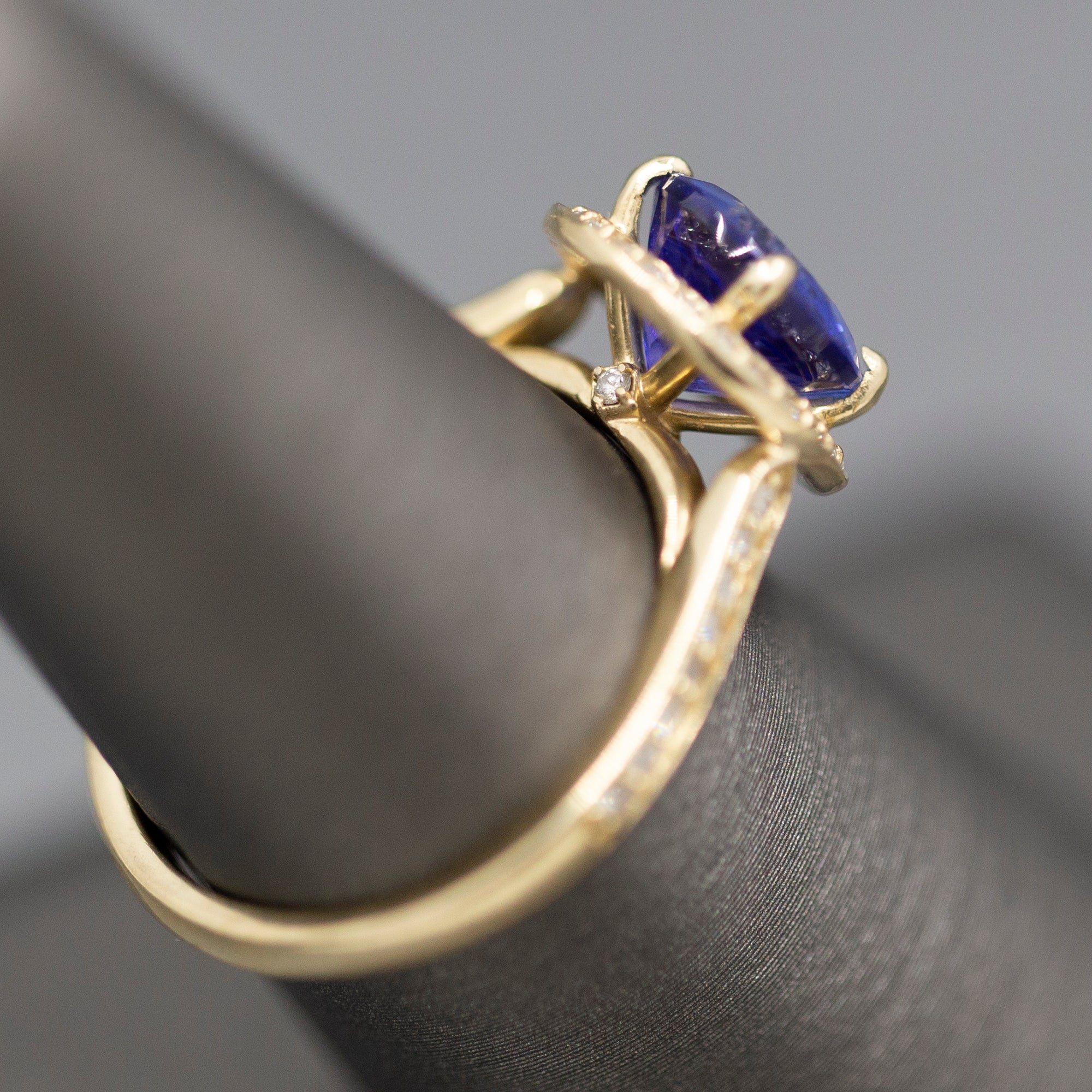 Handcrafted Brilliant Tanzanite and Diamond Halo Ring in 14k Yellow Gold