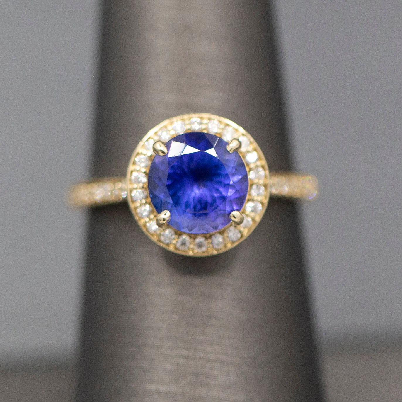 Handcrafted Brilliant Tanzanite and Diamond Halo Ring in 14k Yellow Gold