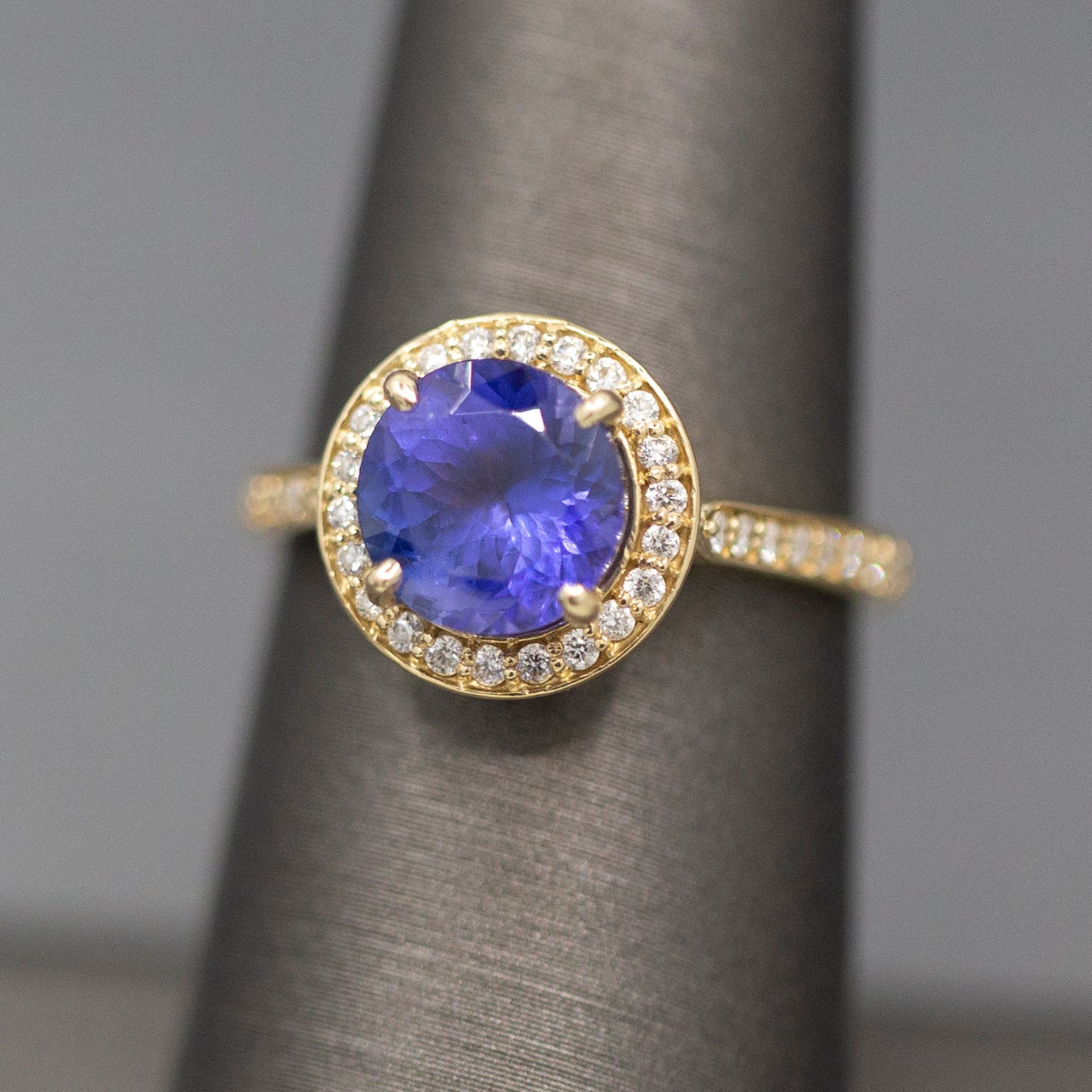 Handcrafted Brilliant Tanzanite and Diamond Halo Ring in 14k Yellow Gold