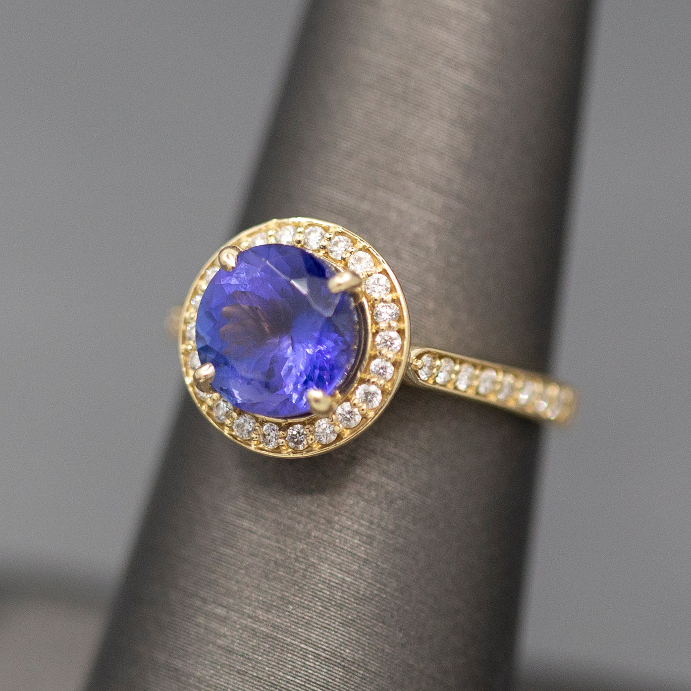 Handcrafted Brilliant Tanzanite and Diamond Halo Ring in 14k Yellow Gold