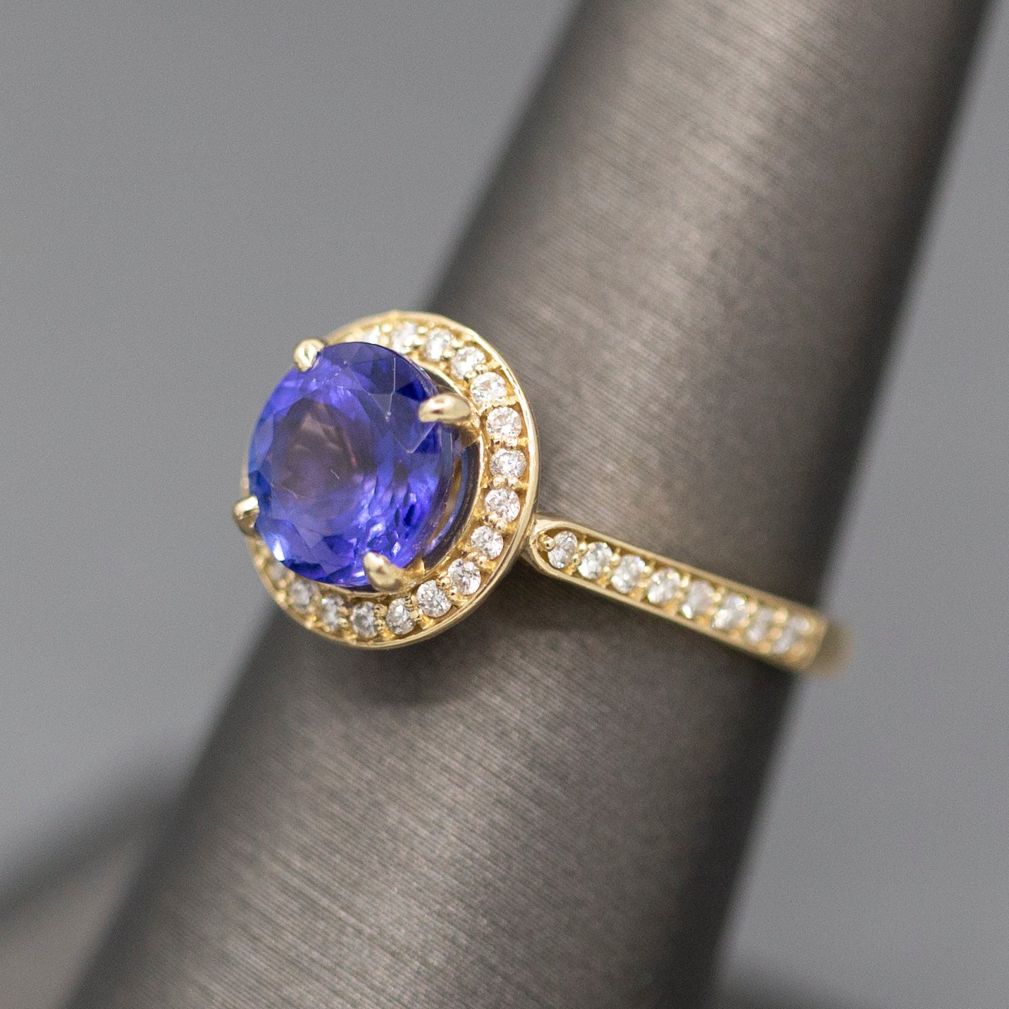 Handcrafted Brilliant Tanzanite and Diamond Halo Ring in 14k Yellow Gold