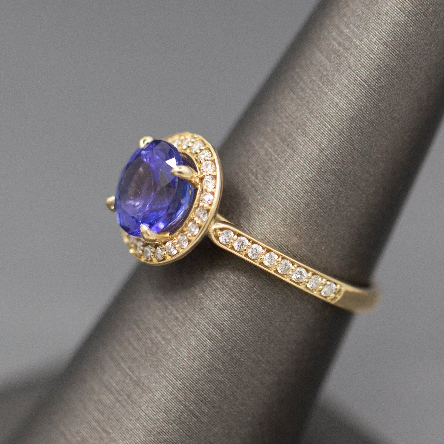 Handcrafted Brilliant Tanzanite and Diamond Halo Ring in 14k Yellow Gold