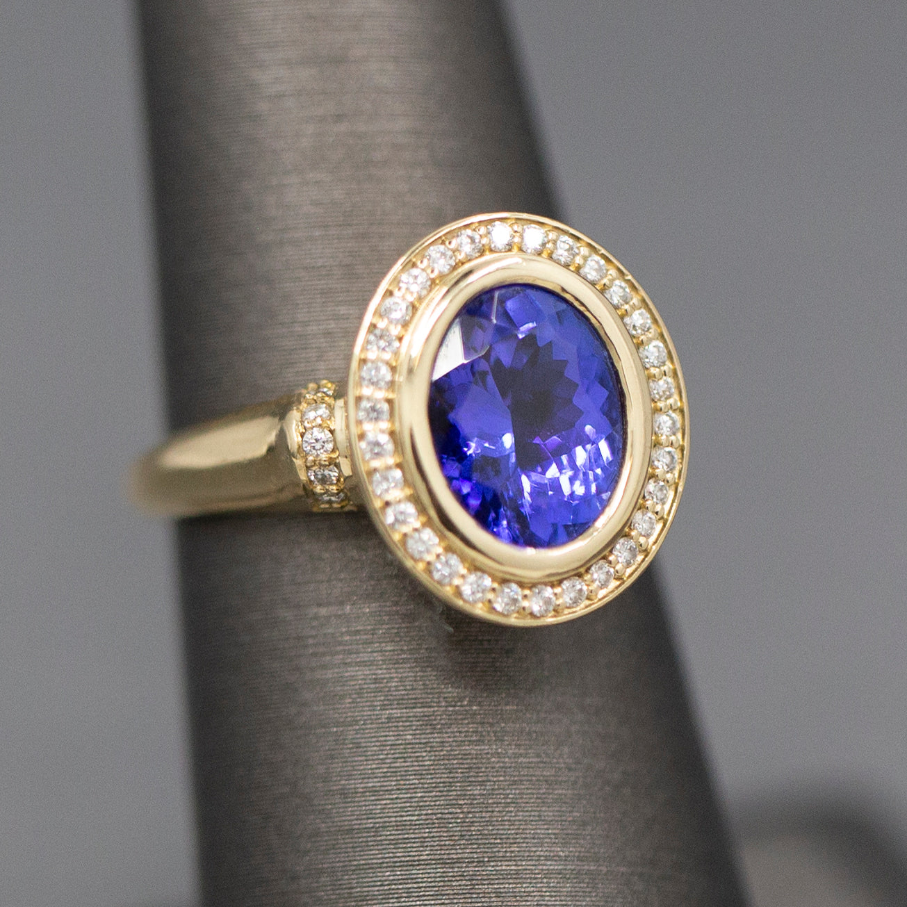 Handcrafted Bold Bezel Set Tanzanite and Diamond Ring in 14k Yellow Gold
