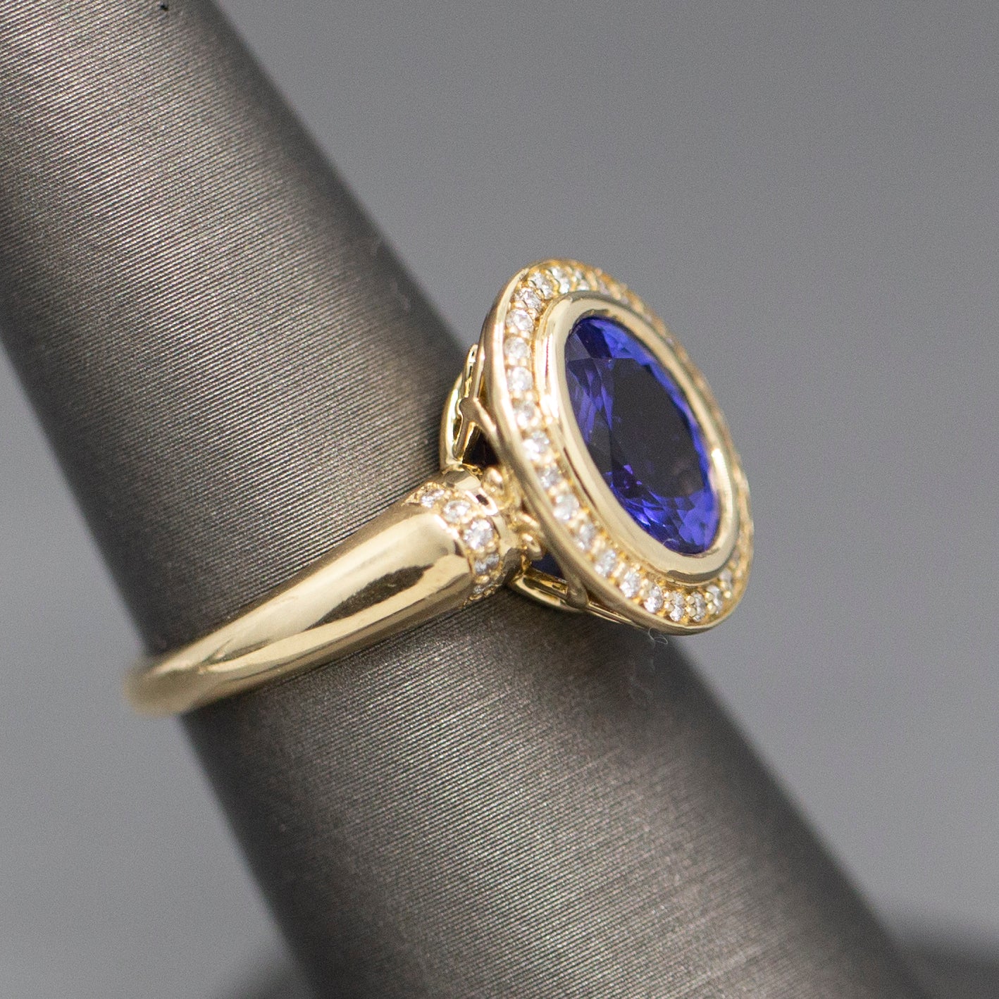 Handcrafted Bold Bezel Set Tanzanite and Diamond Ring in 14k Yellow Gold