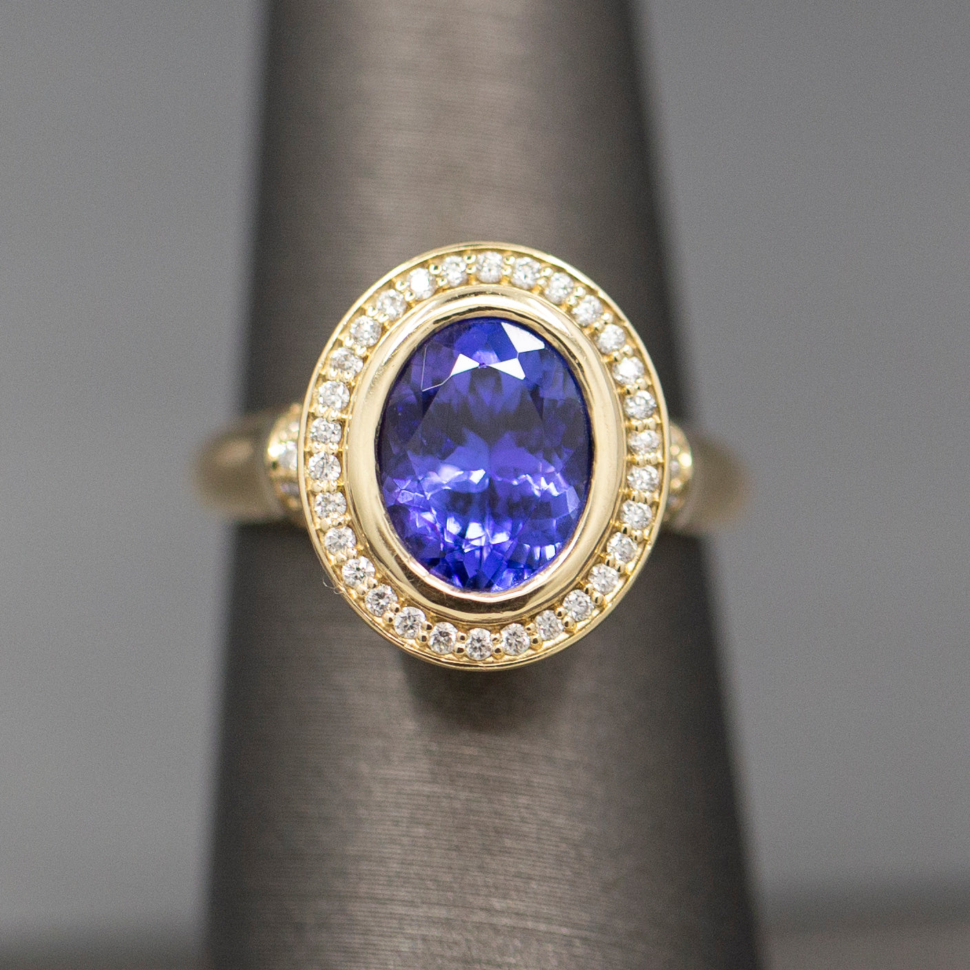 Handcrafted Bold Bezel Set Tanzanite and Diamond Ring in 14k Yellow Gold