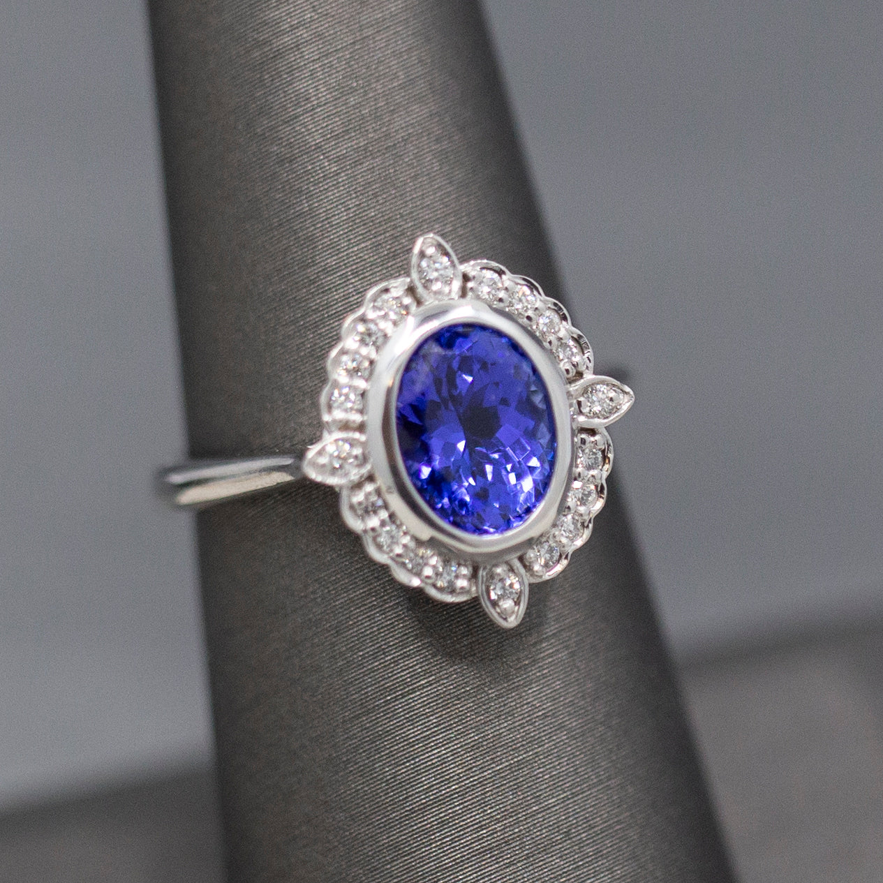Bezel Set Oval Tanzanite and Diamond Accent Compass Ring in 14k White Gold