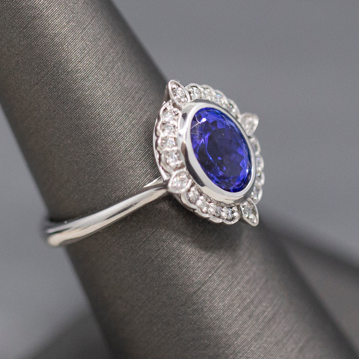 Bezel Set Oval Tanzanite and Diamond Accent Compass Ring in 14k White Gold