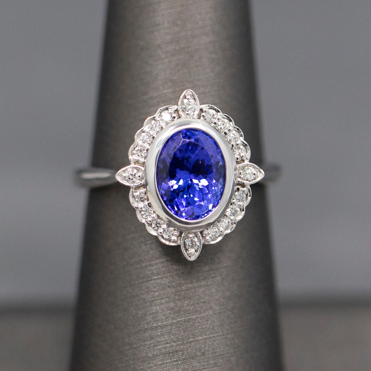 Bezel Set Oval Tanzanite and Diamond Accent Compass Ring in 14k White Gold