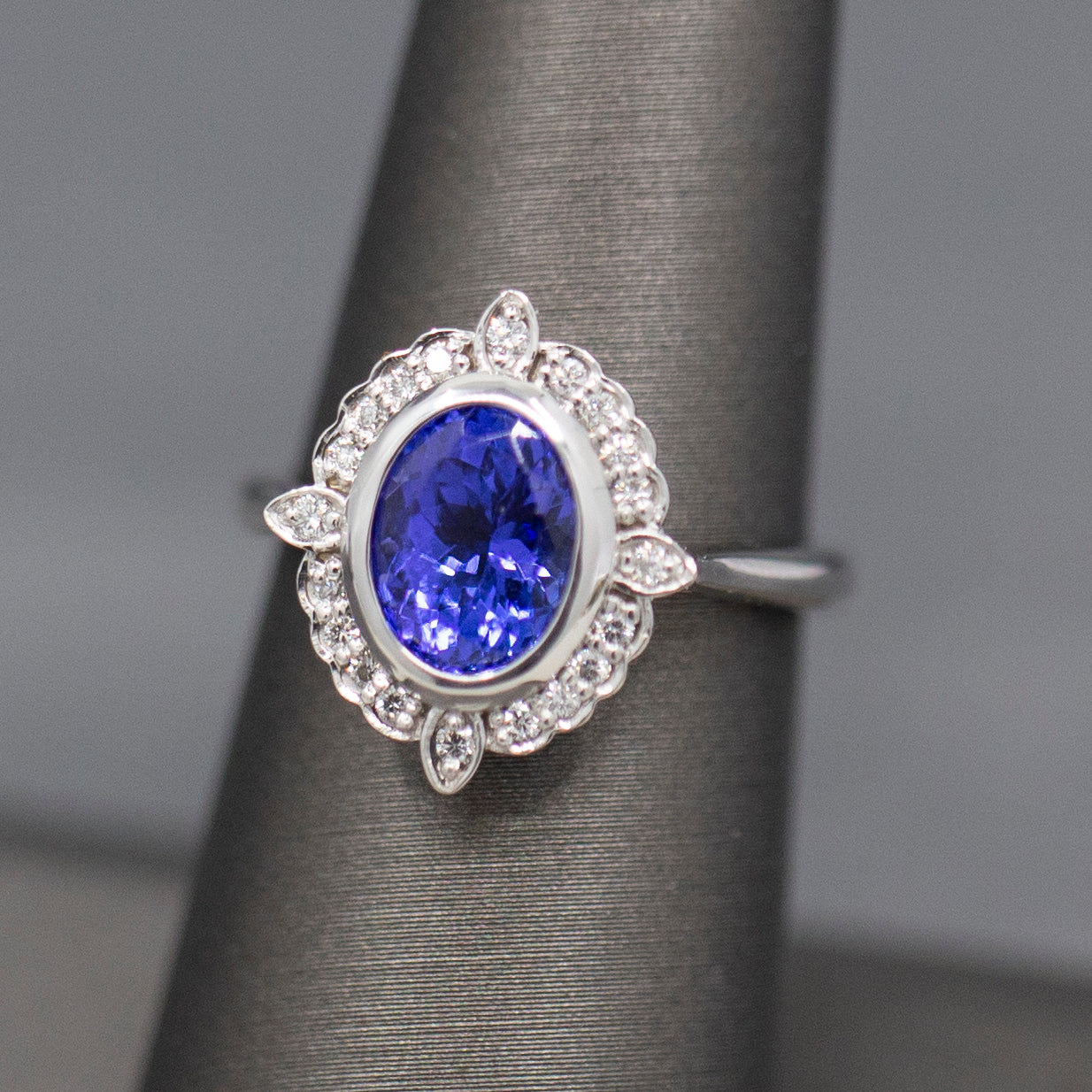 Bezel Set Oval Tanzanite and Diamond Accent Compass Ring in 14k White Gold
