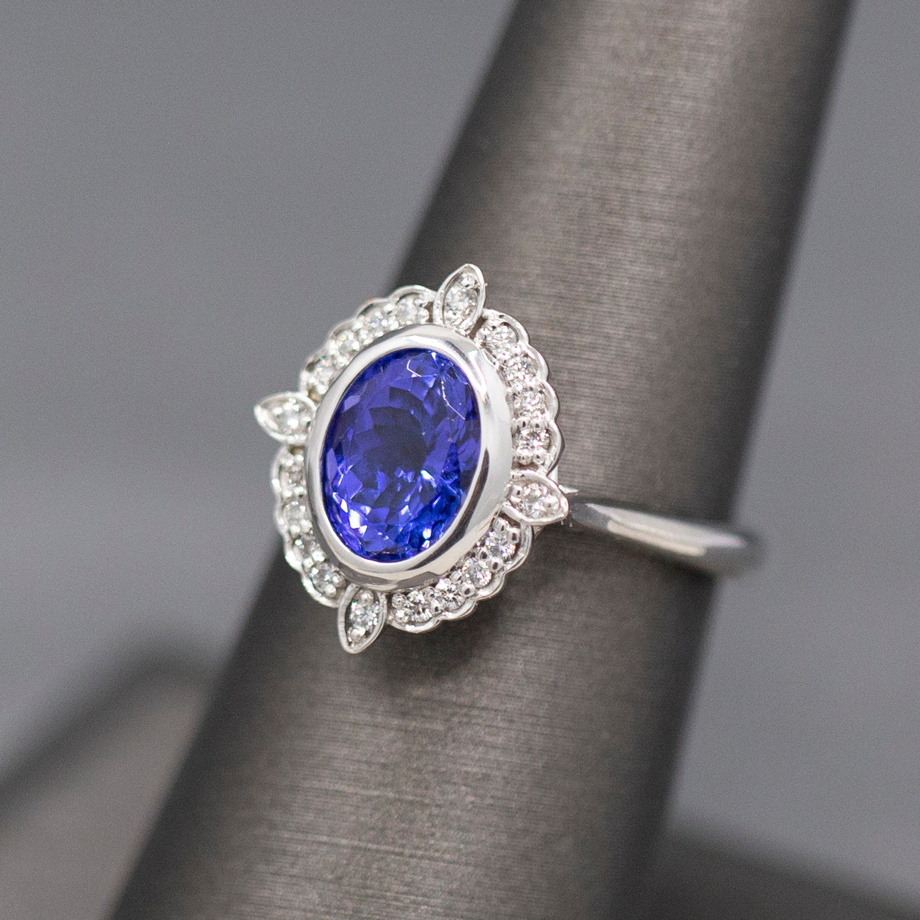 Bezel Set Oval Tanzanite and Diamond Accent Compass Ring in 14k White Gold