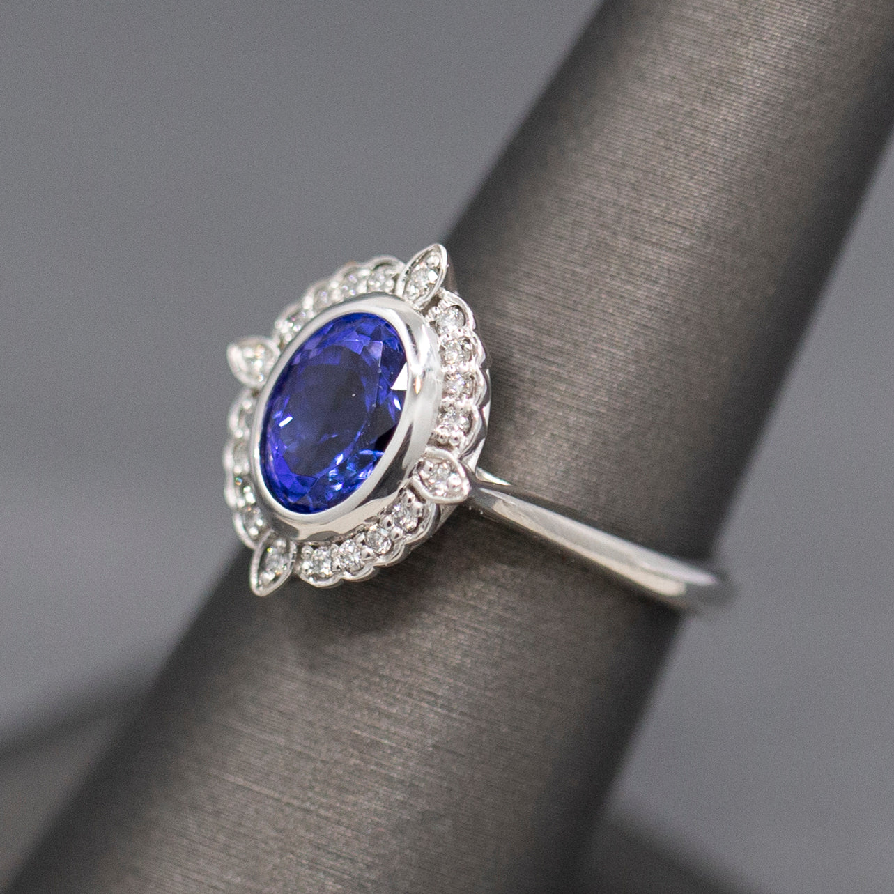 Bezel Set Oval Tanzanite and Diamond Accent Compass Ring in 14k White Gold