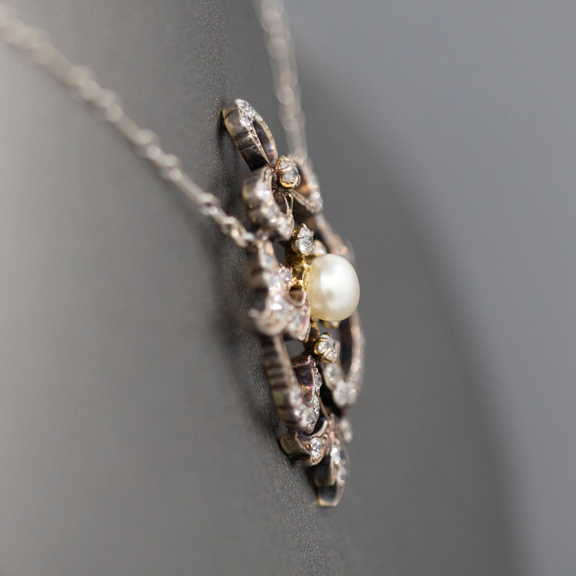 Exquisite Edwardian Natural Pearl and Diamond Bow Necklace in 14k White and Yellow Gold