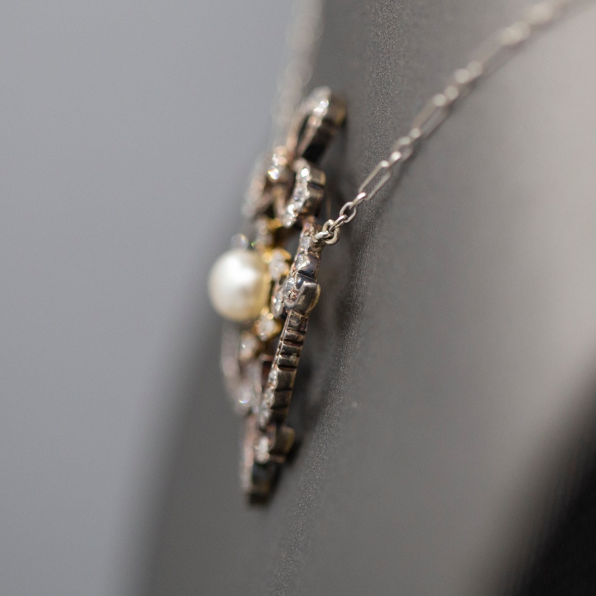 Exquisite Edwardian Natural Pearl and Diamond Bow Necklace in 14k White and Yellow Gold