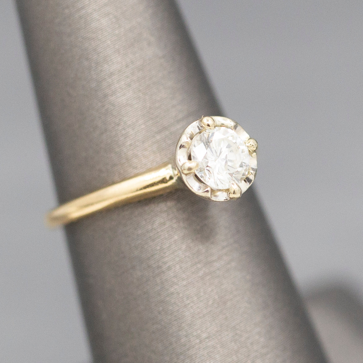 Feminine Round Brilliant Cut Diamond Solitaire Engagement Ring with Illusion Head in 14k Yellow Gold